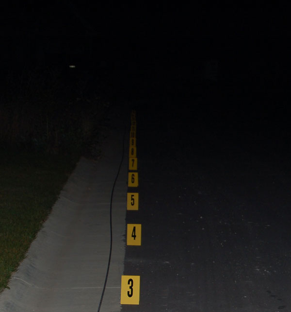 a dark image with yellow evidence markers barely visible