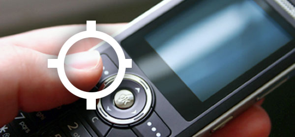 A cell phone held in a hand, with possible location of fingerprint evidence marked with a target symbol